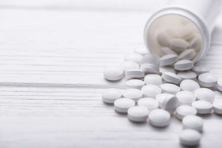 Medicine pills on white table. pharmacy backgroundの写真素材