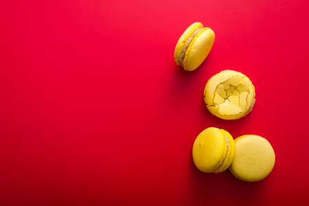 delicious french macaroon cake on a red backgroundの写真素材