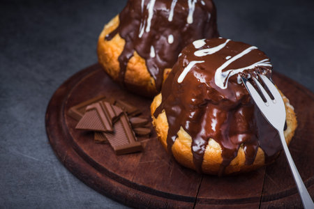 tasty chocolate cupcake on a black table