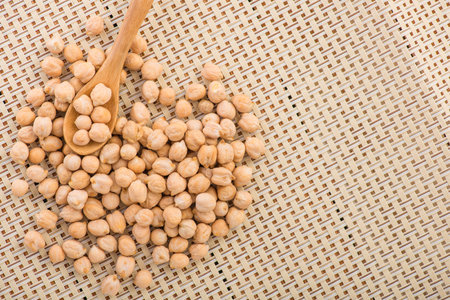 closeup of raw organic chickpeas on a table. nutrition foodの写真素材