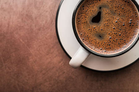 Close up of coffee cup, aroma foam. Hot drink beverage. Top viewの写真素材
