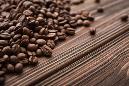 Closeup of natural coffee beans on a wooden table