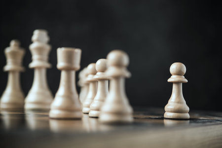The lowest chess piece in game rank pawn. Tactics and Leadership concept. selective focus.