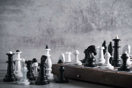 chess board game on a stone background. chessboard battleの写真素材