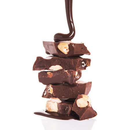 chocolate bars pouring syrup isolated on white background