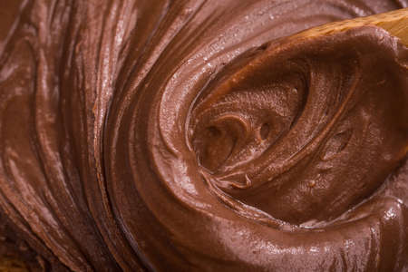 Macro photo of chocolate cream or spread on fullの写真素材