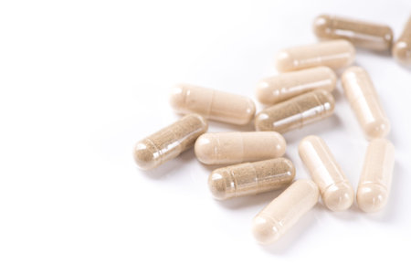 Health herbal medical capsule isolated on a white background
