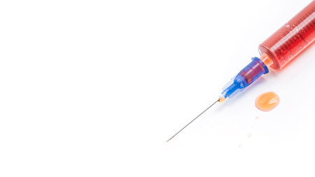 Syringe with injection isolated on a white background. vaccination, blood sampling.