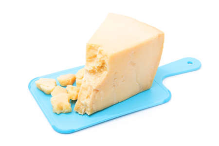 Parmesan cheese pieces isolated on white backgroundの写真素材