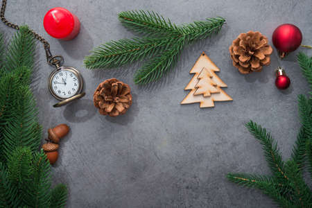 The golden clock, whose arrow are about twelve o'clock New Year celebration. Merry Christmas concept background. top view. flat layの写真素材