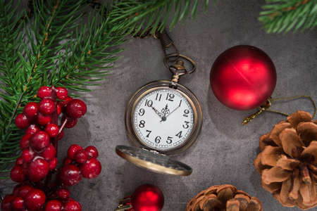 The golden clock, whose arrow are about twelve o'clock New Year celebration. Merry Christmas concept background.の写真素材