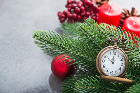The golden clock, whose arrow are about twelve o'clock New Year celebration. Merry Christmas concept...
