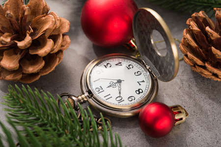 The golden clock, whose arrow are about twelve o'clock New Year celebration. Merry Christmas concept background.の写真素材