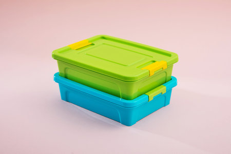 Plastic container box on a pastel color background