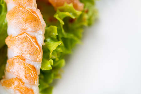 Closeup of shrimp in a fresh saladの写真素材