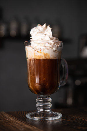 Coffee frappe with creamy foam in a cafe