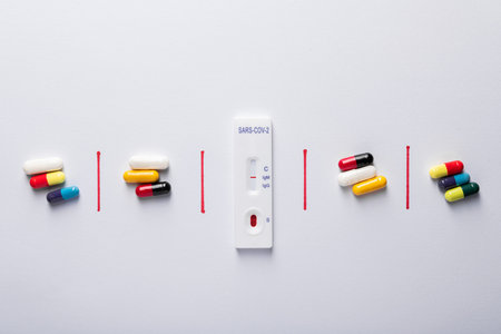 Colored pills capsule on white