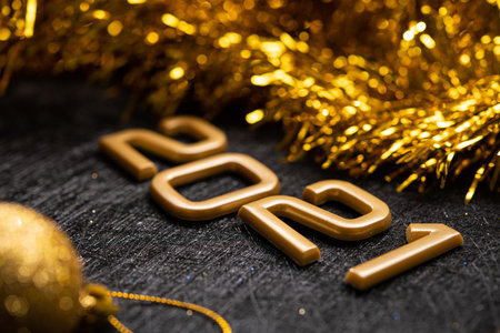 Golden 2021 number on a black background. Happy New Year celebrate banner.