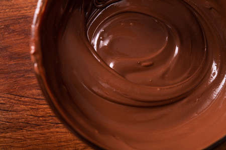 Closeup of melted chocolate. Food dessert background.の写真素材