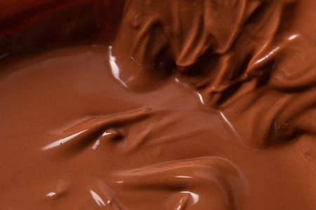 Closeup of melted chocolate. Food dessert background.の写真素材