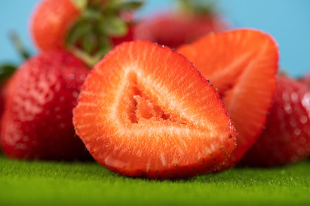 Fresh summer natural strawberry on a green grass. Food fruit background.の写真素材
