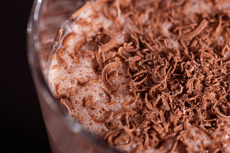 Closeup of chocolate cocktail with shavings. Sweet cocoa drink background.の写真素材