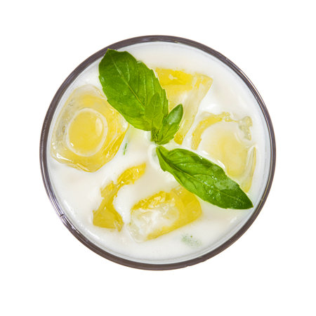 Top view of diet refreshment basil cocktail with ice cubes isolated on white background. top view.の写真素材