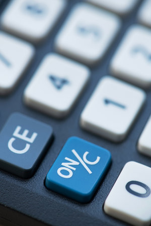 Closeup calculator. white buttons. financial calculation background.の写真素材