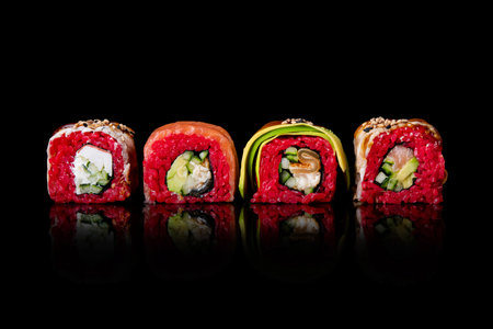 Set of red sushi isolated on a black background. Asian food concept.の写真素材