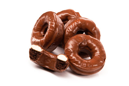 Tasty glaze chocolate donuts isolated on a white background.の写真素材