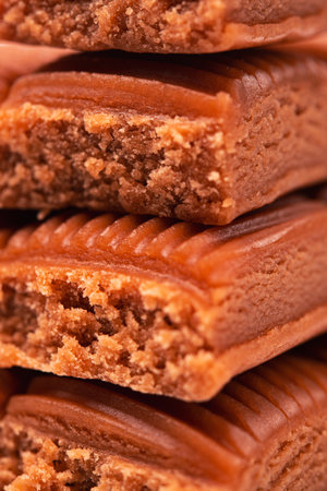 Sweet chocolate toffee dessert bar. closeup photo. macro.の写真素材