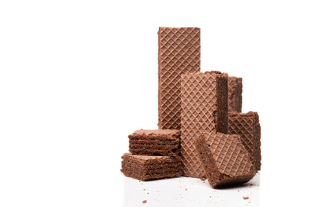 Chocolate waffles isolated on a white background. Crispy snack dessert.の写真素材