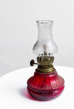 Traditional oil lamp of Indonesia isolated in white background. Traditional handmade's lamp