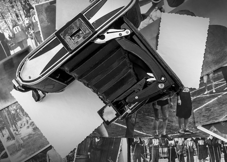 retro camera on the background of old photosのeditorial素材