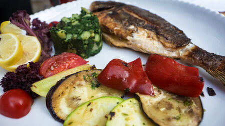 grilled fish with vegetablesの写真素材