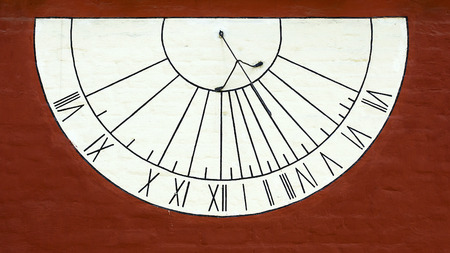 old sundial on the wallの写真素材