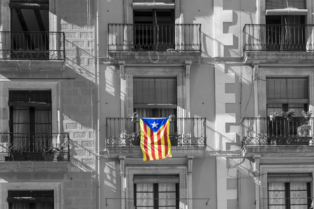 Catalan flag on the facade of the buildingの写真素材