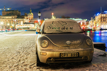 STOCKHOLM, SWEDEN -JANUARY 4: Volkswagen Beetle car with a sign on the windshield (I love Sweden) on the waterfront in Stockholm January 4, 2016のeditorial素材