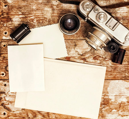 retro camera on a background of old wood