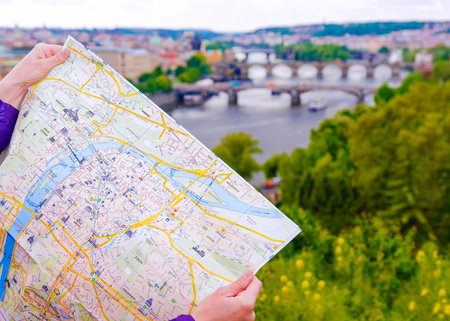 Tourist map of Prague on the background of the panorama of the city, Czech Republic