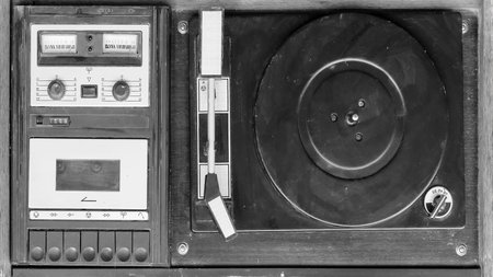 Retro record player vinyl records and audio cassettesの写真素材