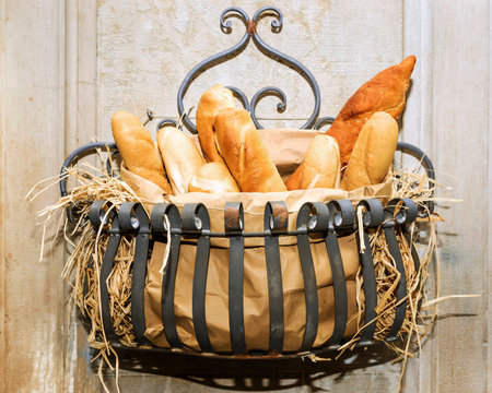 Fresh white bread in a basketの写真素材