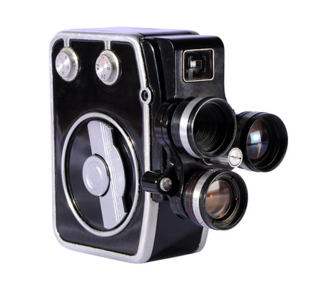 Old movie camera isolated on a white background