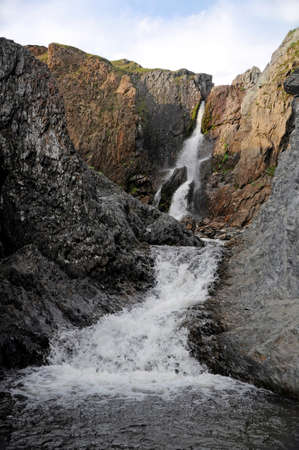 waterfall on the mountain river among the rocksの写真素材