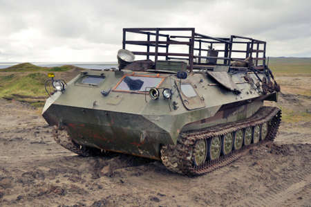  Old rusty Soviet Towing Vehicle Light Armoured MT-LBU in tundraの写真素材