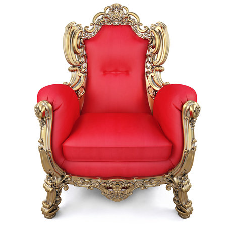 elegant armchair of red fabric and gold-plated body. isolated on whiteの写真素材