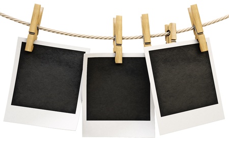 Photo frames on the rope. isolated on white.の写真素材