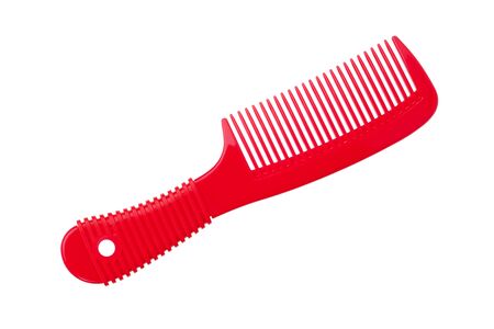 A beautiful red comb hair on a white backgroundの写真素材
