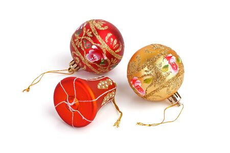 Three elegant Christmas decorations on a white backgroundの写真素材