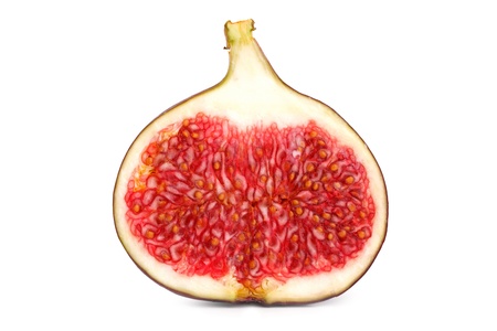 Half of fresh figs with lots of seeds on a white backgroundの写真素材